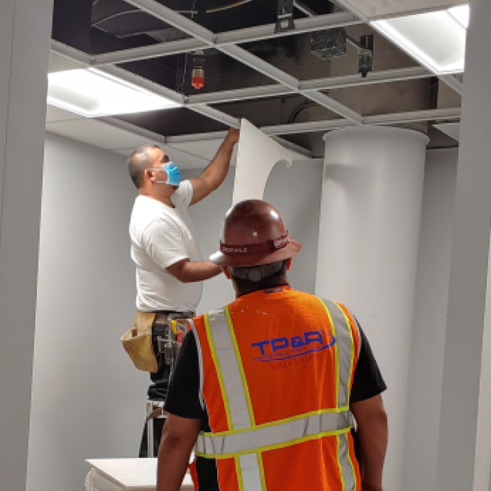 Construction workers install ceiling tiles for the new 3,800 sq.ft. animation suite in the Edith O’Donnell Arts & Technology Building.