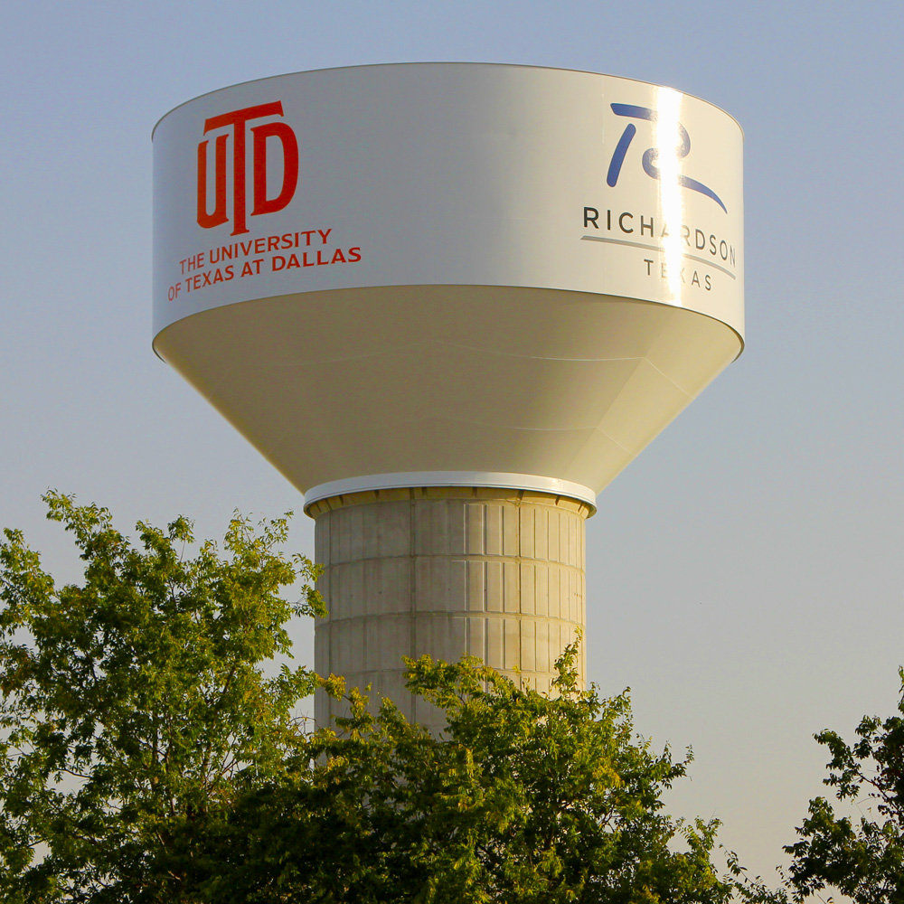 The tank for the new million-gallon City of Richardson water tower, show the UTD and Richardson logos.