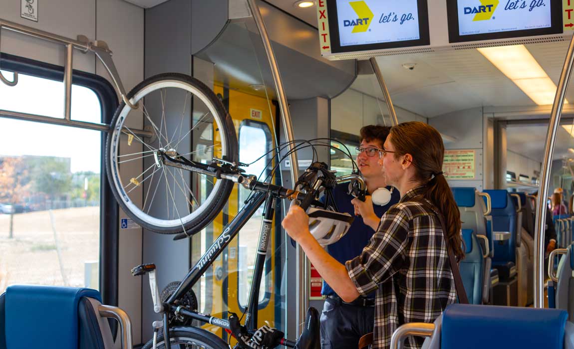 A pair of future riders try out the bike rack.