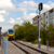 A DART Silver Line train passes by Northside at UT Dallas on its way into UTD Station.