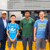 Dr. Calvin D. Jamison, vice president for Facilities & Economic Development (left), Dr. Richard C. Benson, president of The University of Texas at Dallas (right), and a few UTD students examine the train’s engine.